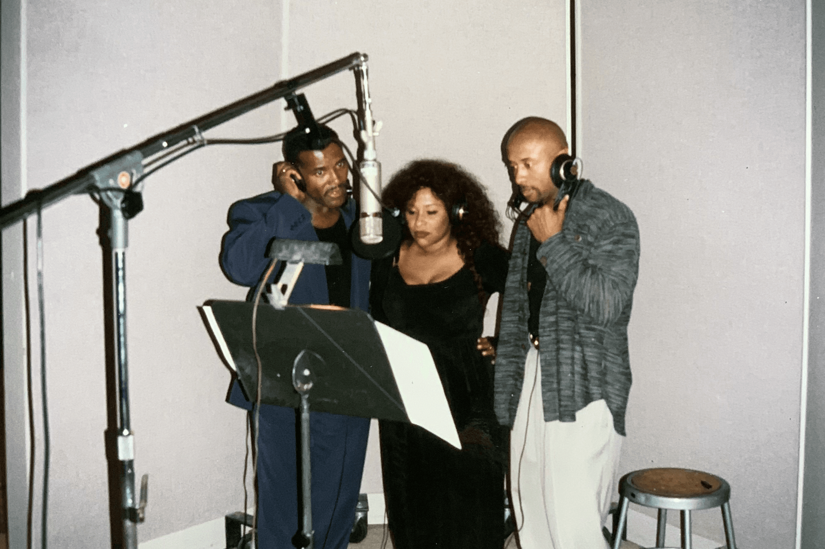 Robert D. Palmer with Chaka Khan and Howard McCrary in a recording studio. Photograph from the Palmer family archive.