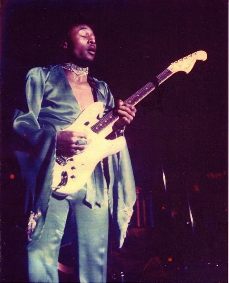 Robert D. Palmer playing guitar. Photograph from the Palmer family archive.